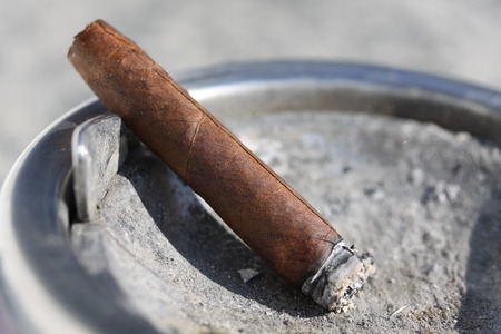 Cigar in an ashtrayの写真素材