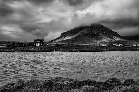 Dramatic Icelandic landscape with a mountain.の写真素材
