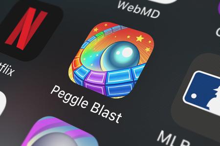 London, United Kingdom - September 29, 2018: Close-up shot of Electronic Arts's popular app Peggle...