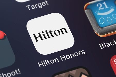 London, United Kingdom - October 05, 2018: Close-up of the Hilton Honors icon from Hilton Worldwide, Inc. on an iPhone.のeditorial素材