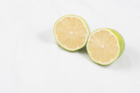 Green Lemon  with White background for very importand foodの写真素材