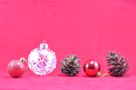 Christmas ornament decoration on red backgroundの写真素材