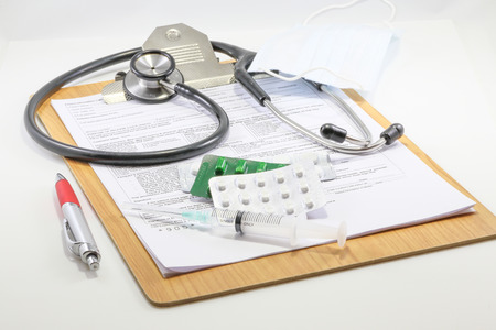 Medical report clipboard with stereoscope pen medicine syringe
