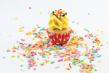 Small Colorful Cup Cake assorted on white backgroundの写真素材