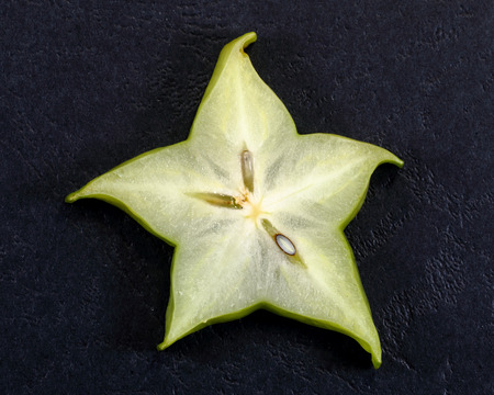 Carambola Star Fruit on black background fruit artの写真素材