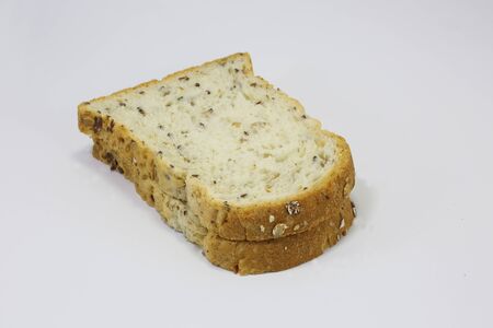 Multigrain  wholegrain bread Loaf  sliced on white background