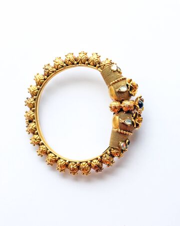 Gold ornament bracelet jewelry on white background