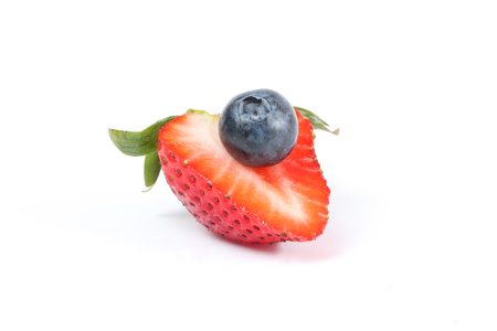 Blueberry Strawberry Fruit Red Dark ripe sweet one white backgroundの写真素材
