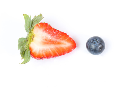 Blueberry Strawberry Fruit Red Dark ripe sweet one white backgroundの写真素材