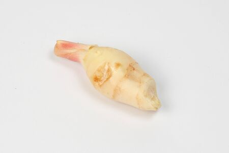 Ginger raw young fresh spice on white background