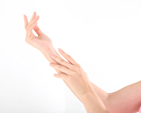 Woman hand arm wrist finger touch youngの写真素材