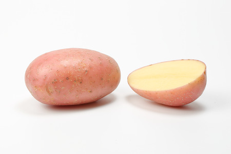 Potato new fresh red yellow on white backgroundの写真素材