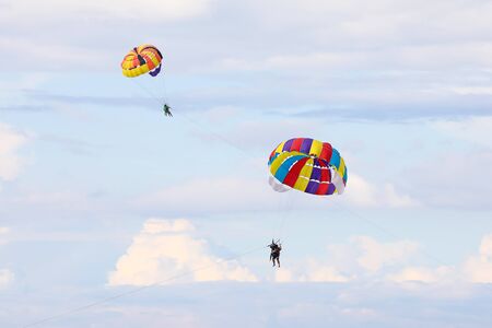 Parasailing parachute Free Flying air sky boat water Paragliding
の写真素材