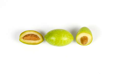 Green young olive on white background の写真素材