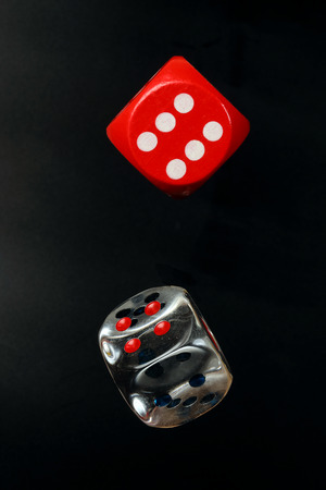 Colorful playing gaming dice number transparent on black background の写真素材