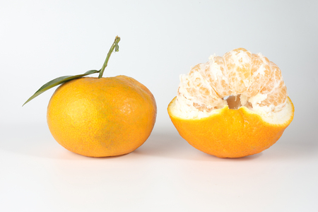 Giant Mandarin Orange Tangerine fruit on white background の写真素材
