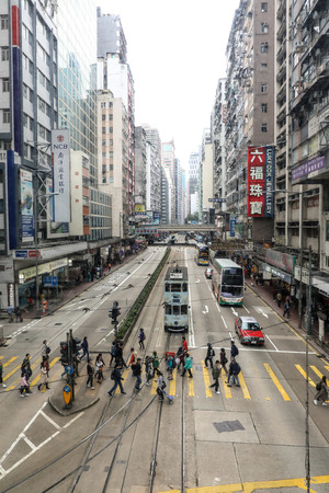 CAUSEWAY BAY, HONG KONG-FEBRUARY 18, 2018 - Causeway Bay is Hong Kong's energetic retail heart. Luxury malls, department stores and boutiques. A mix match of old and new both buildings and transport.のeditorial素材