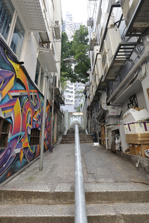 CENTRAL, HONG KONG â March 12, 2019: Central Mid level escalator, Hollywood Road, Soho with its retro modern and graffiti.のeditorial素材