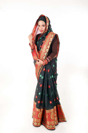 South east Asian Malay race ethnic origin woman wearing Indian dress costume sharee headscarf...