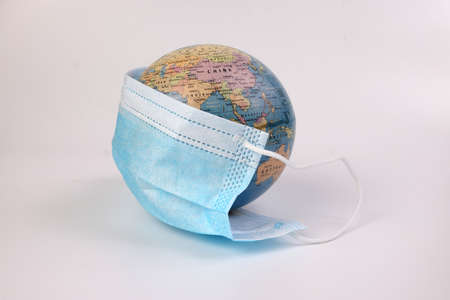 globe planet world map earth wearing face mask on white background