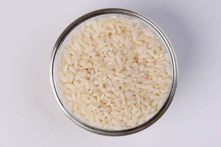 Short grain pilaf polau risotto rice on white backgroundの写真素材