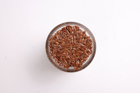 Flex seed flaxseed closeup in small glass jar bottleの写真素材