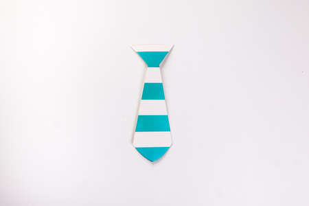 White and blue neck tie shape paper die cut selfie portrait party fun paper prop sticker stick on white backgroundの写真素材