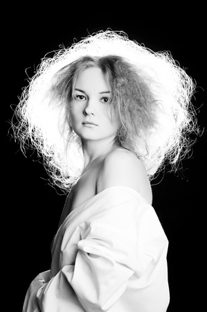 Black and white portrait of sensual woman with fluffy hair.の写真素材