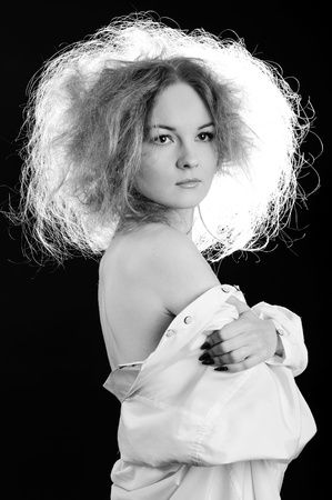 Black and white portrait of sensual woman with fluffy hair.の写真素材