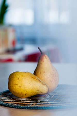 Two natural pears on the table to the breakfast の写真素材