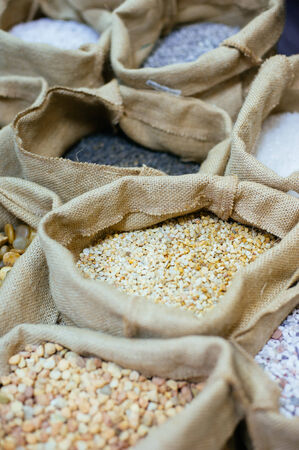 Sacks with decorative stones. Close up.の写真素材
