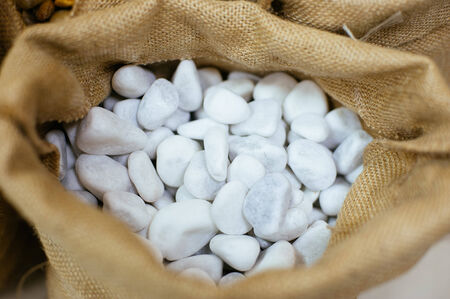 Sacks with decorative stones. Close up.の写真素材