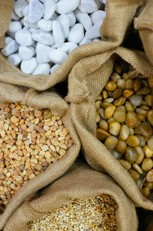 Sacks with decorative stones. Close up.の写真素材