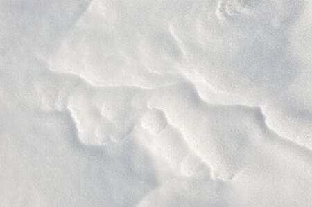 Thin crust of ice over snow.の写真素材