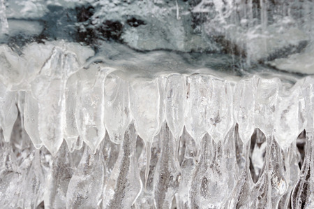 Spring melting of ice. Icicles gallery.の写真素材