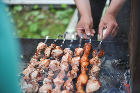 Close up of pork and chicken meat shashlik.の写真素材