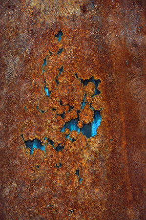 Background image of a piece of rusty iron.の写真素材
