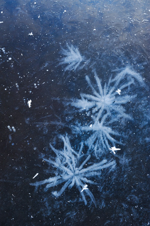 Air bubbles frozen in the water in a bizarre form .の写真素材