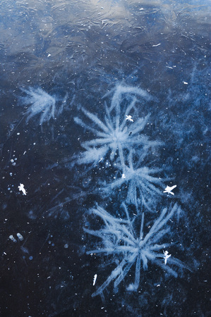 Air bubbles frozen in the water in a bizarre form .の写真素材