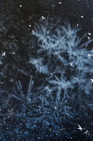 Air bubbles frozen in the water in a bizarre form .の写真素材