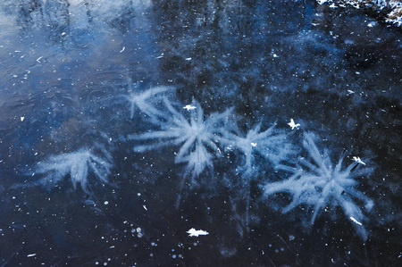 Air bubbles frozen in the water in a bizarre form .の写真素材
