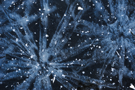 Air bubbles frozen in the water in a bizarre form .の写真素材