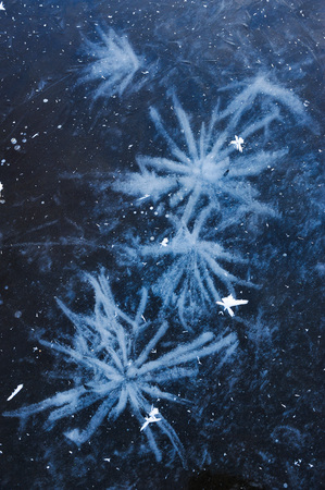 Air bubbles frozen in the water in a bizarre form .の写真素材