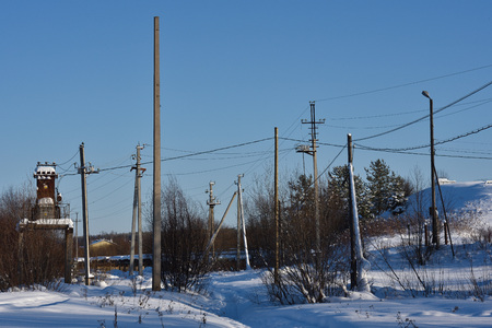 Electric poles away from the village.の写真素材