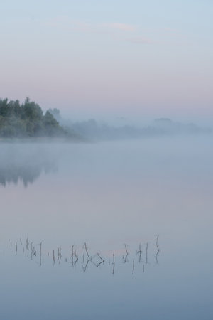 Morning fog in the river valley.の写真素材