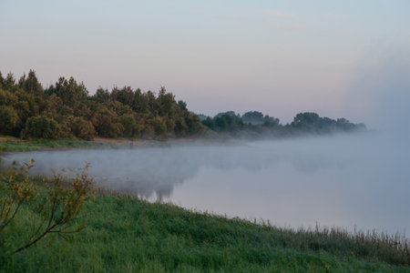 Morning fog in the river valley.の写真素材