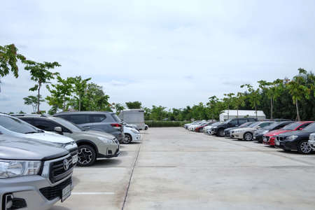 NAKORNPHATOM,THAILAND - JUNE 14,2020 -Many cars parking in front of a Cafe & restaurant area in Nakornchaisri,Nakornphatom,in outdoor parking lotのeditorial素材