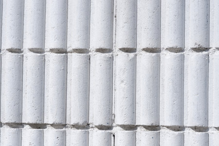 A pattern of hard white brick,a wall surface for background backdropの写真素材