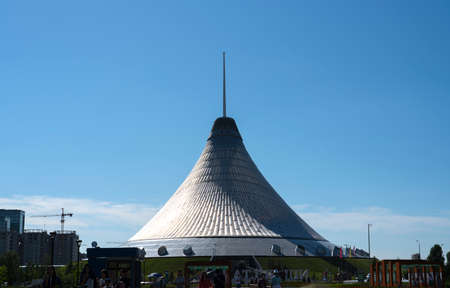 NUR-SULTAN, KAZAKHSTAN - 11 July 2021: Astana Royal Marquee Khan Shatyr Entertainment with a View of a Man Entering the Building on a Sunny Blue Sky Day Aのeditorial素材