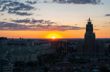 Nur-Sultan, Kazakhstan, July, 2021. City buildings of the capital against the backdrop of the sunset.のeditorial素材
